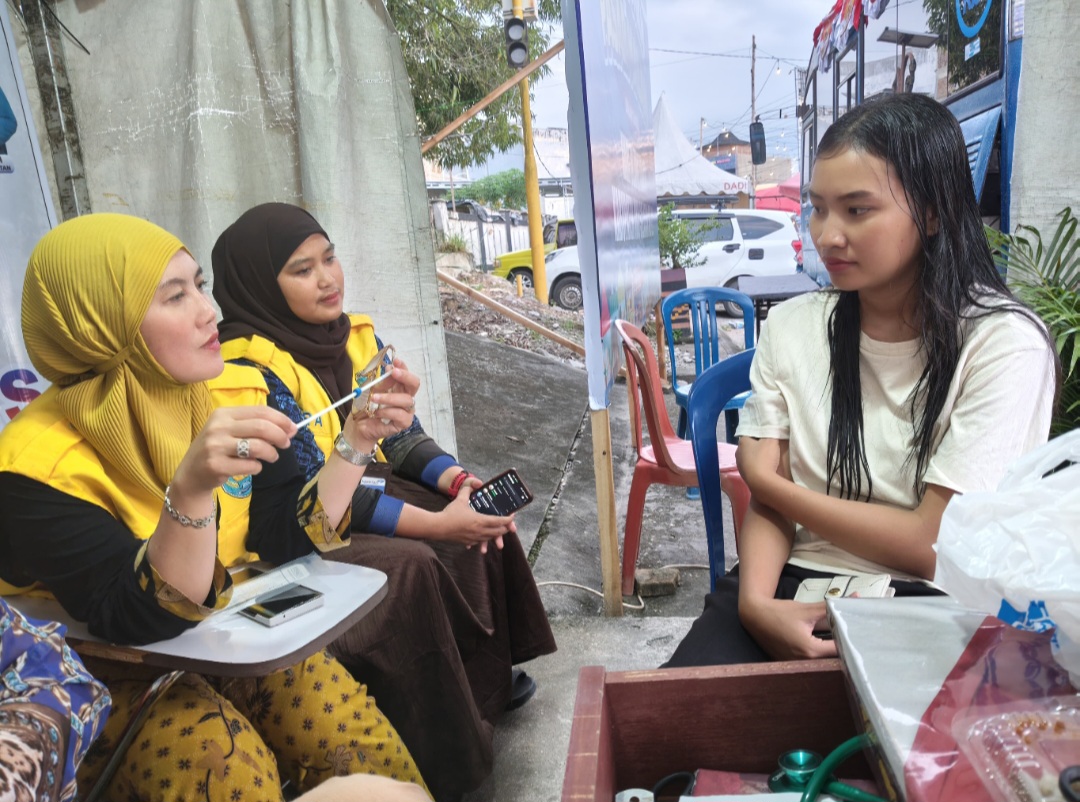 Dinas PPPAPPKB OKU Selatan Layani 234 Akseptor KB di Pasar Malam